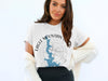 White t-shirt with Eagle Mountain Lake Texas map and compass design.
