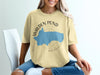 Yellow t-shirt with Walden Pond Massachusetts map and compass design.