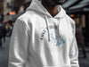 White hoodie with "Lake Travis Texas" and compass graphic.