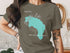 Teal map silhouette of Cariboo Lake, British Columbia on a grey t-shirt.