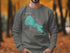 Grey sweatshirt with "Beautiful Clear Lake California" map graphic.