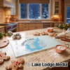 A glass cutting board featuring a blue map of Lavon Lake sits on a granite kitchen counter surrounded by holiday baking supplies.