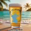 Glass of beer with Lake Pleasant Arizona map graphic on a beach.