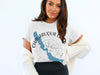 White t-shirt with Chautauqua Lake shape and compass, New York.