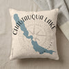 Cream pillow with Chautauqua Lake map and compass rose graphic, "New York" text.