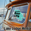 Georgian Bay Life sticker on a boat window, with Lake Lodge Media logo below.