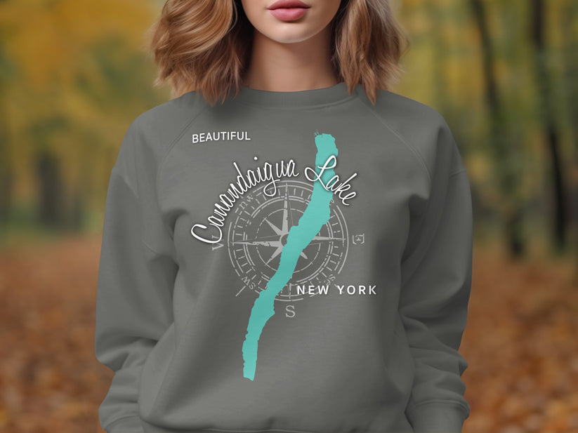 Gray sweatshirt with "Canandaigua Lake NEW YORK" and compass design.