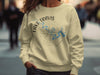 Cream sweatshirt with "Lake Travis Texas" and a compass rose design.