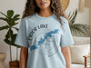 Light blue t-shirt with compass and map of Prior Lake, Minnesota graphic.