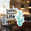 Lake Norman Life sticker with turquoise lake outline on window.