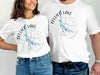 White t-shirts featuring Tellico Lake outline map with compass design and Tennessee text.
