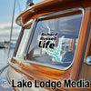 Sticker on boat window: "Richard Russell Life" and lake graphic; "Lake Lodge Media" text.