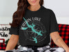 Black t-shirt with Jordan Lake Alabama map and compass graphic.