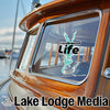 Candlewood Lake Life sticker on a boat window with Lake Lodge Media logo.