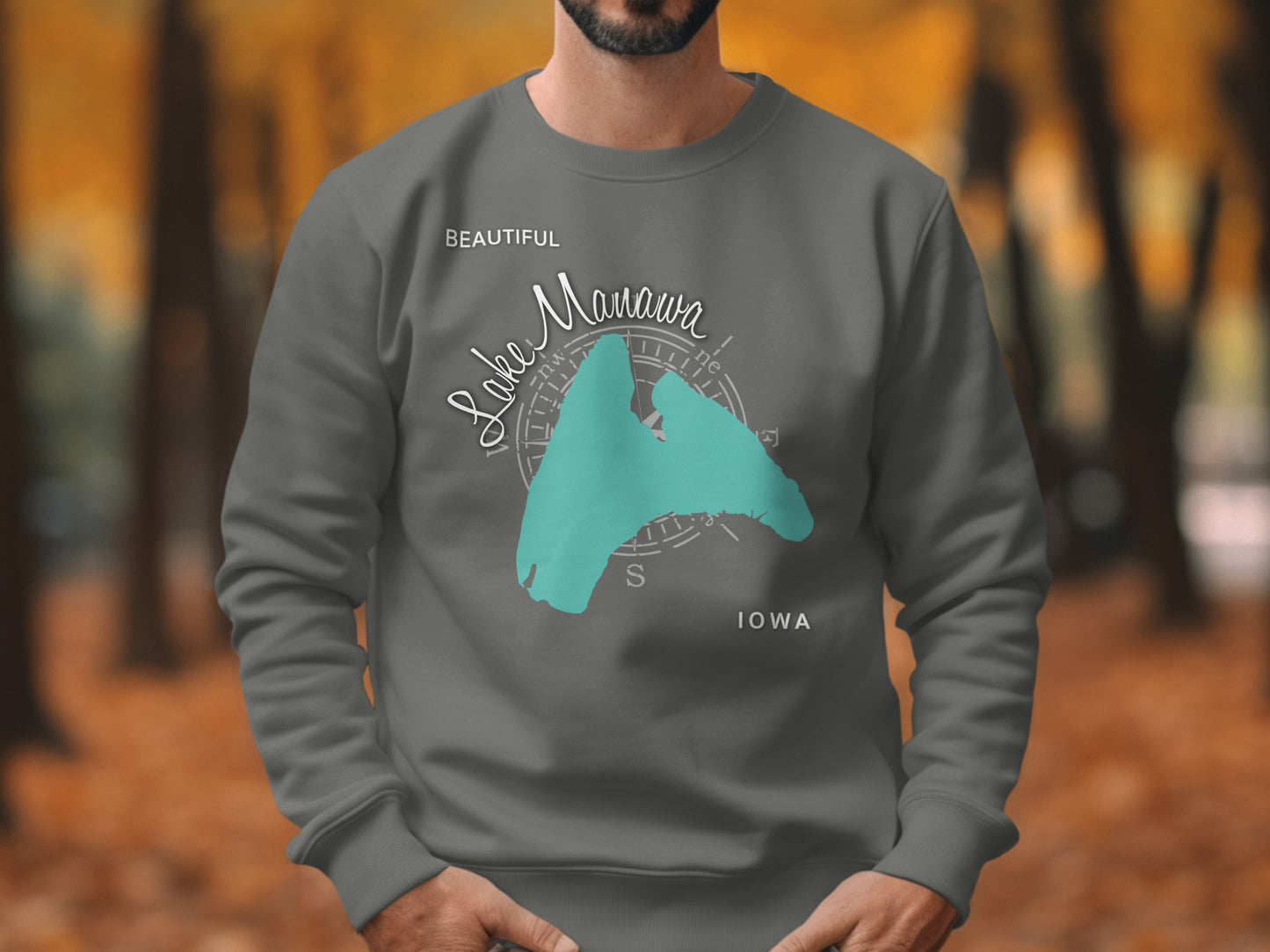 Gray sweatshirt with teal "Beautiful Lake Manawa Iowa" design and compass rose.