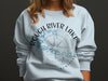 Light blue sweatshirt with "Rough River Lake Kentucky" text and compass graphic.