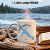 White mug with blue Lake Darling Iowa silhouette and compass rose design.