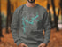 Gray sweatshirt with a teal compass rose and Lake Allatoona Georgia map graphic.