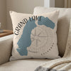 Pillow with blue Grand Lake Colorado map outline and compass graphic.