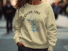 Norfolk Lake Arkansas map design on a beige crewneck sweatshirt.