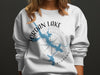White sweatshirt with Jordan Lake Alabama map and compass graphic.
