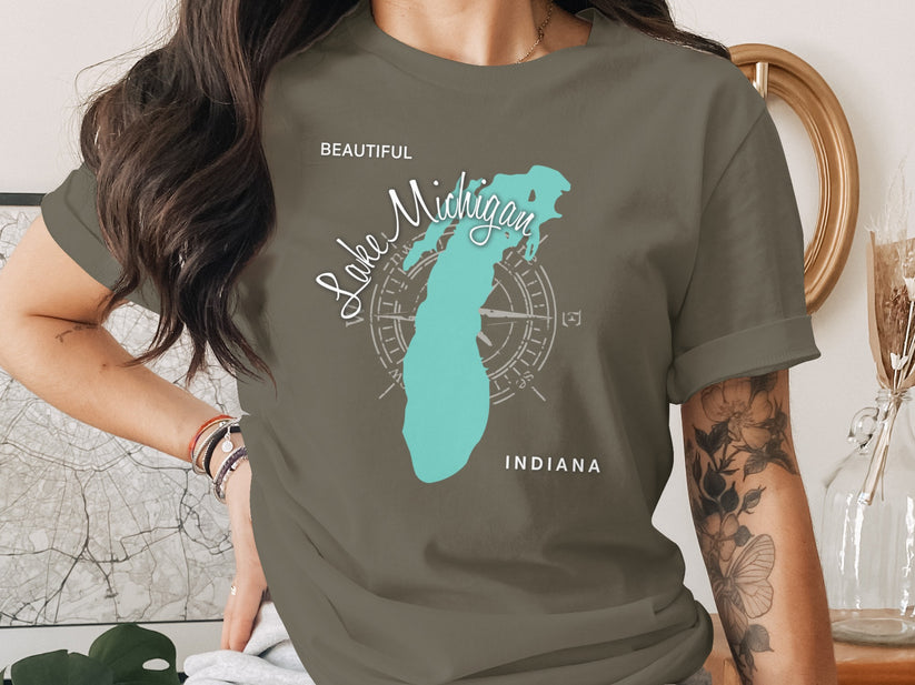 T-shirt with Lake Michigan outline and compass rose on a woman's chest.
