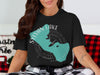 Black t-shirt with Sylvan Lake, South Dakota map and compass design.