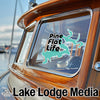 "Pine Flat Life" and "Lake Lodge Media" text logos on a boat window and hull.