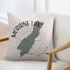 Pillow with Moraine Lake map silhouette and compass design in Alberta.