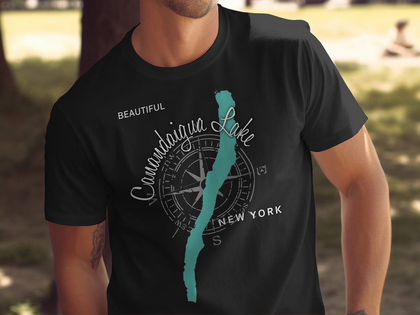 Canandaigua Lake map on black t-shirt with compass and text.