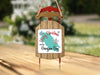 Sled ornament with "Merry Christmas FROM Georgian Bay" text and snowflakes.