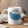 White mug with blue Lake McConaughy shape and Nebraska text.