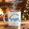 White mug with Rangeley Lake map and compass graphic, steaming hot coffee.
