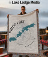 Man holding blanket with Prior Lake, Minnesota map and compass design.