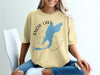 Yellow t-shirt graphic with blue Snow Lake outline and compass.